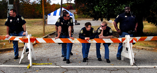 Police officers earning their overtime pay (Photos: John Grant)